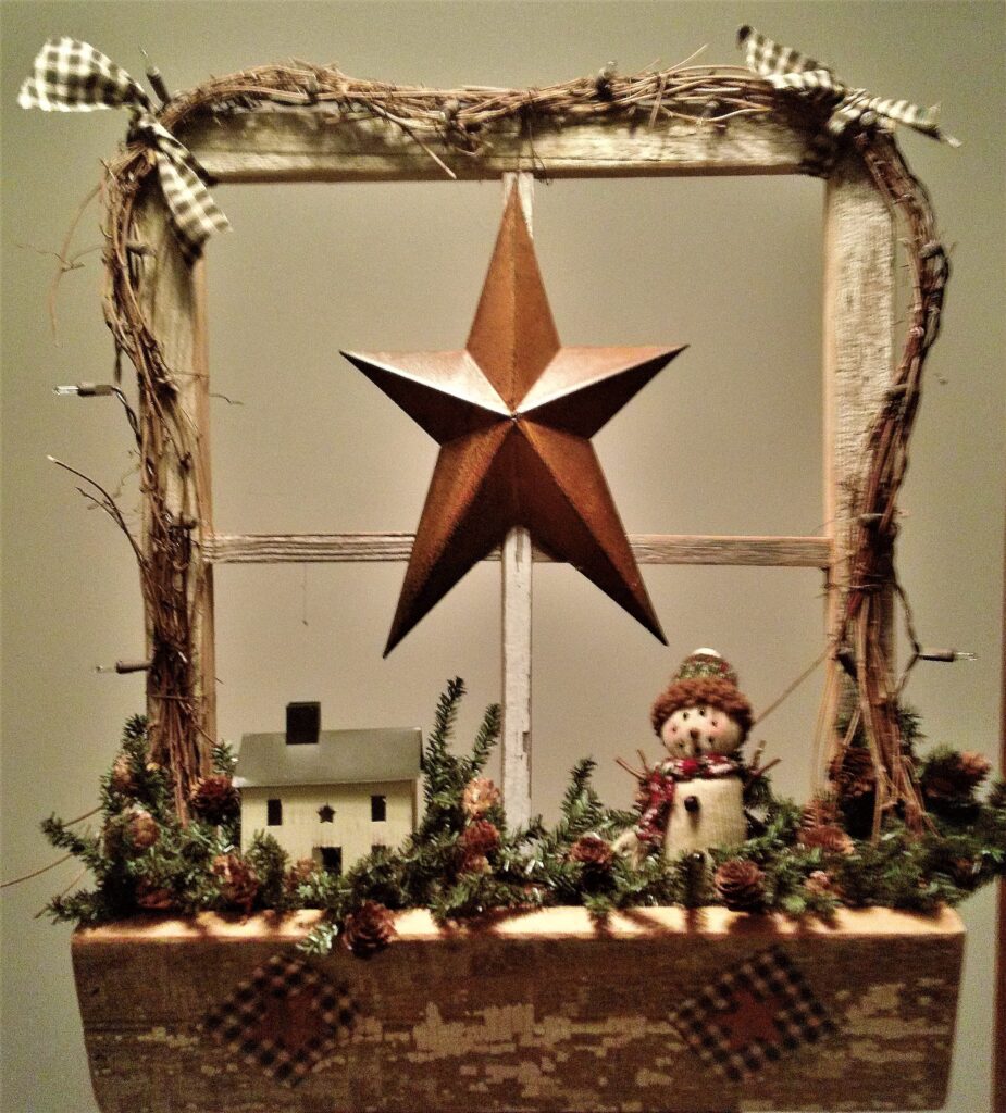 A window with a star and some decorations