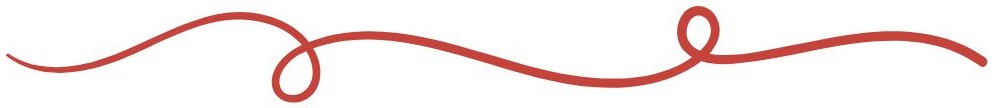 A red stick is laying on the ground