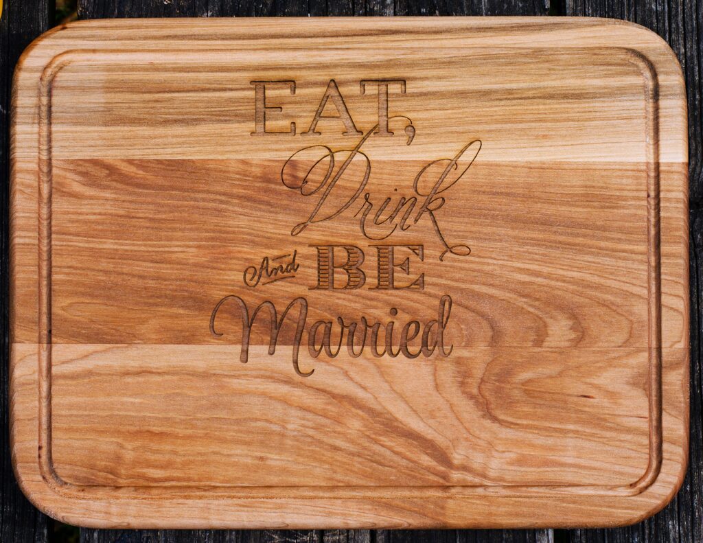 Eat, drink, and be married wood board.