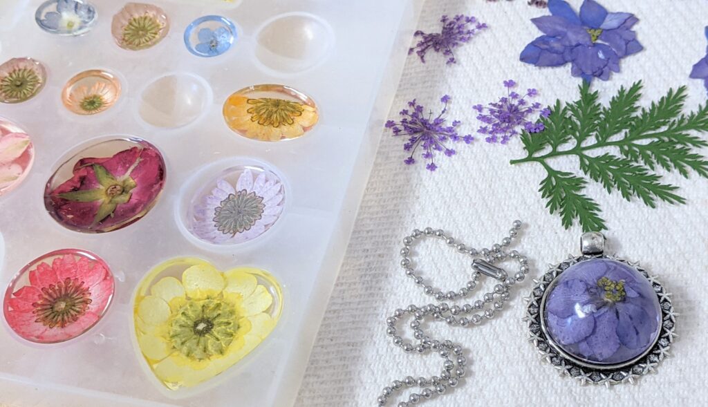 Resin flower pendants and necklace.