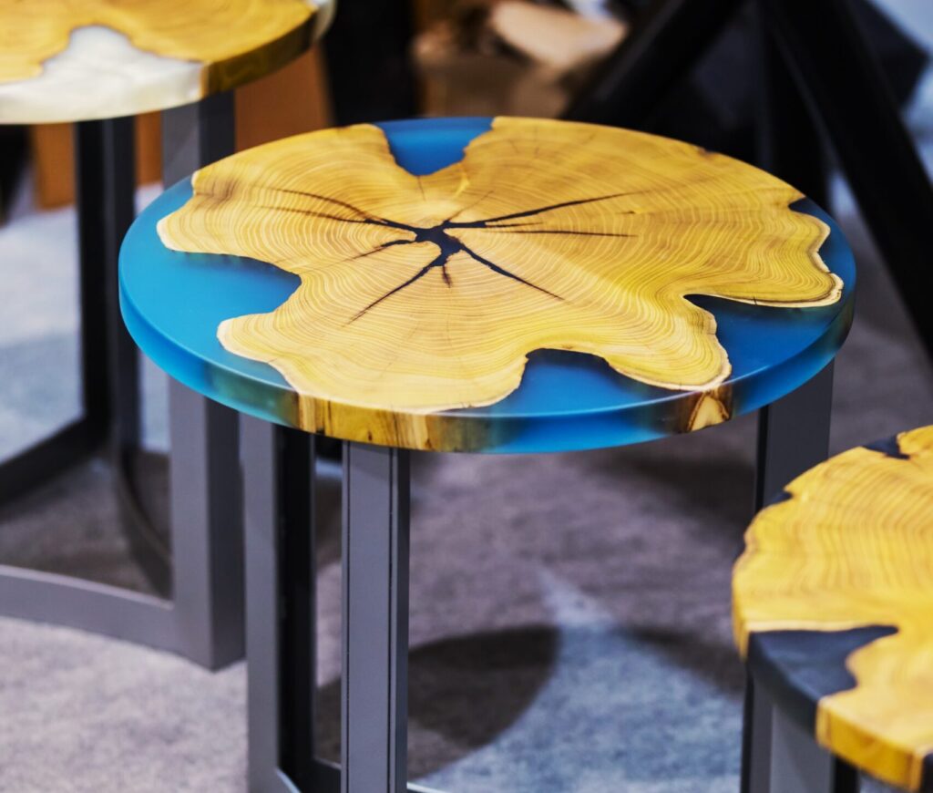 Wooden side table with blue resin.