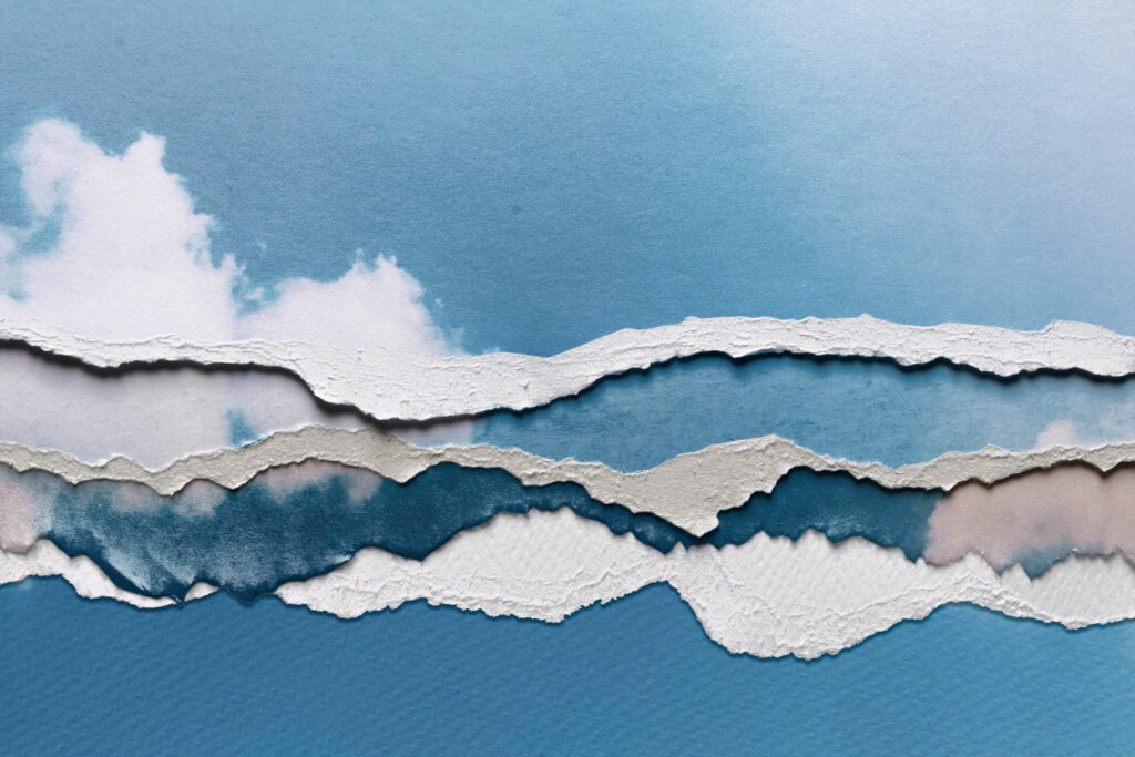 Torn paper layers, blue sky design.