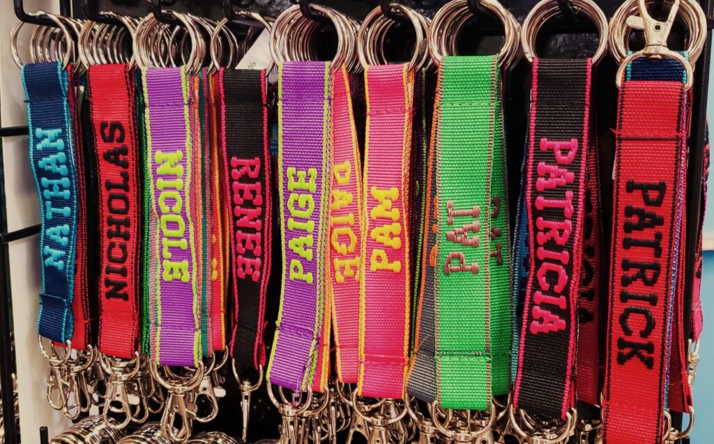 Colorful personalized keychains with names.